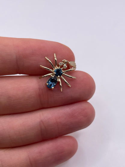 9ct gold London blue topaz and diamond spider pendant