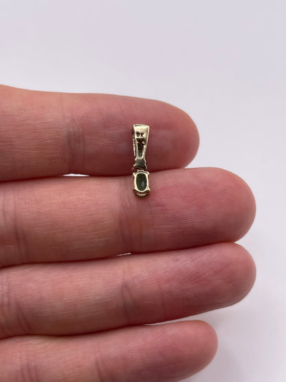 9ct gold emerald and diamond pendant