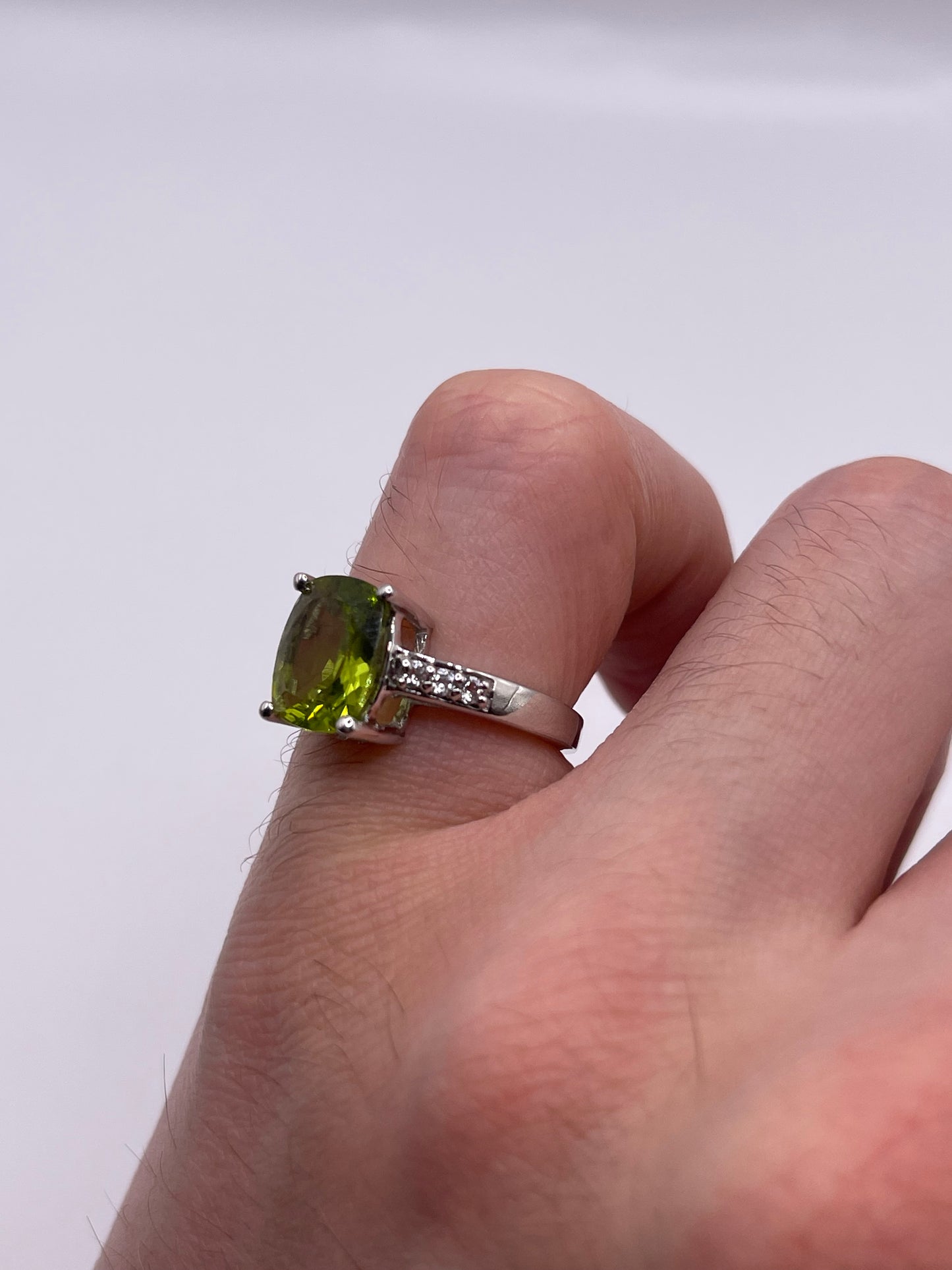 Silver peridot and topaz ring