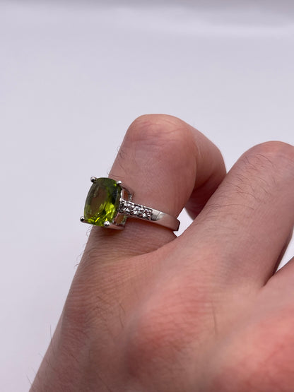 Silver peridot and topaz ring