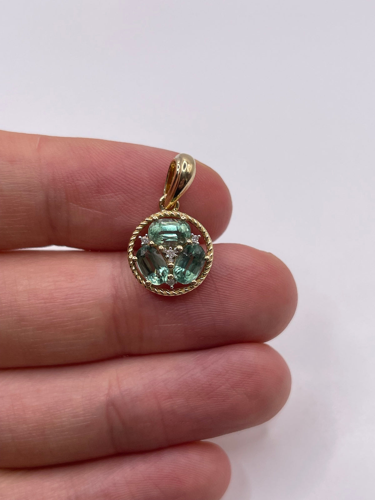 9ct gold green kyanite and diamond pendant