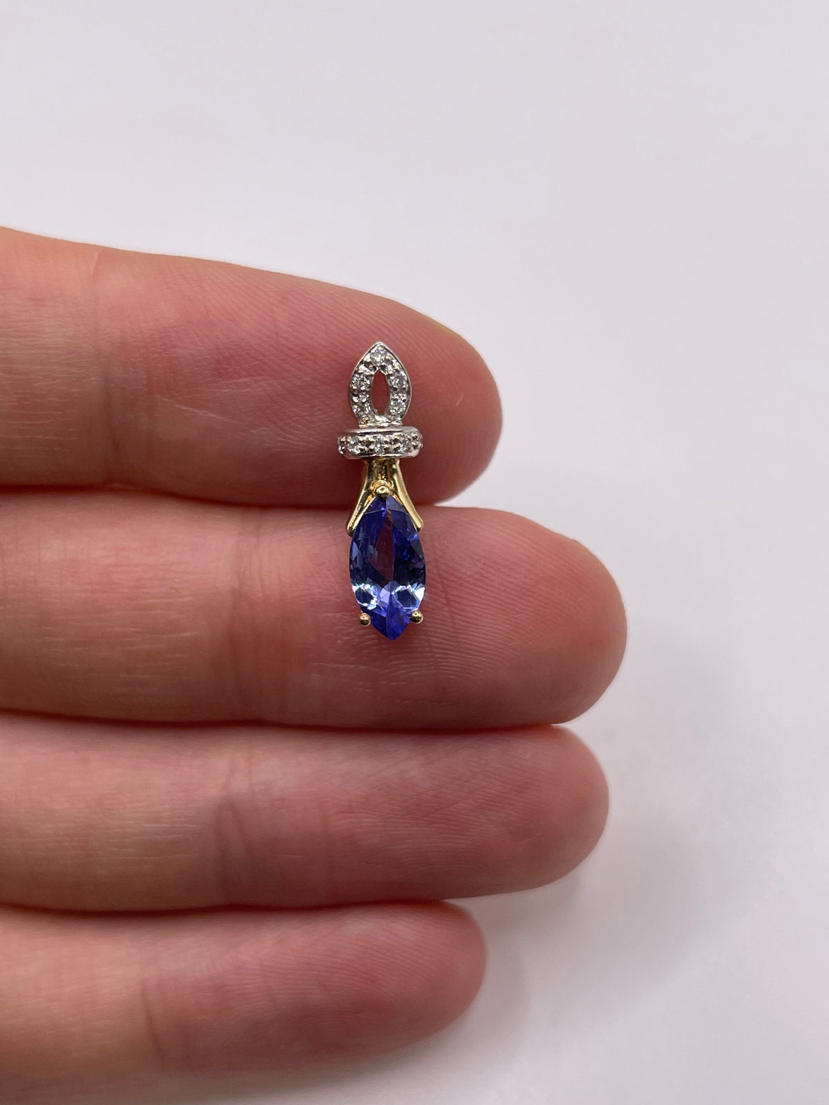 9ct gold tanzanite and diamond pendant