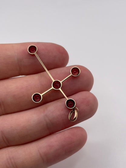 Antique 9ct rose gold garnet cross pendant