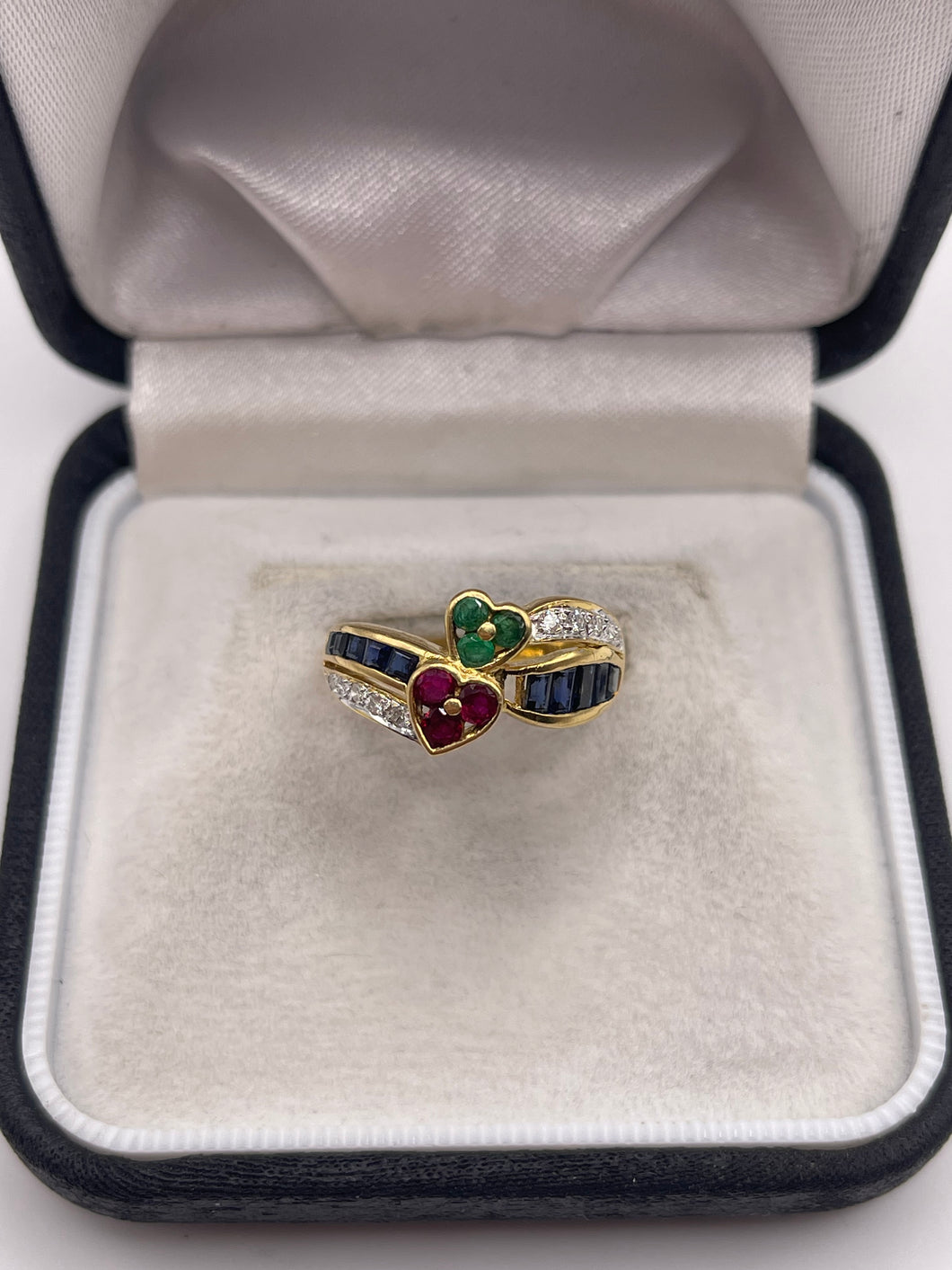 18ct gold ruby, sapphire, emerald and diamond ring