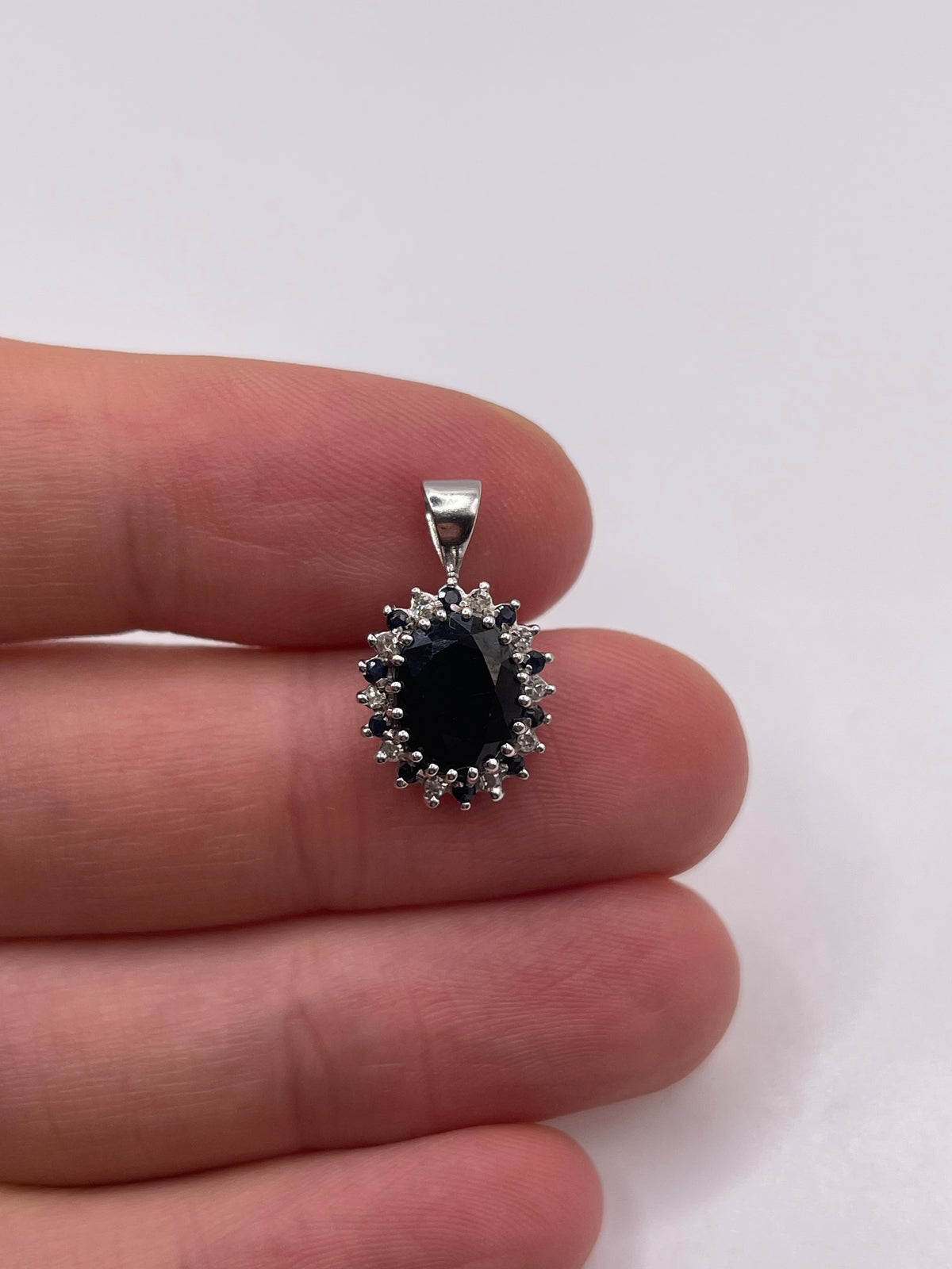 9ct white gold sapphire and diamond pendant