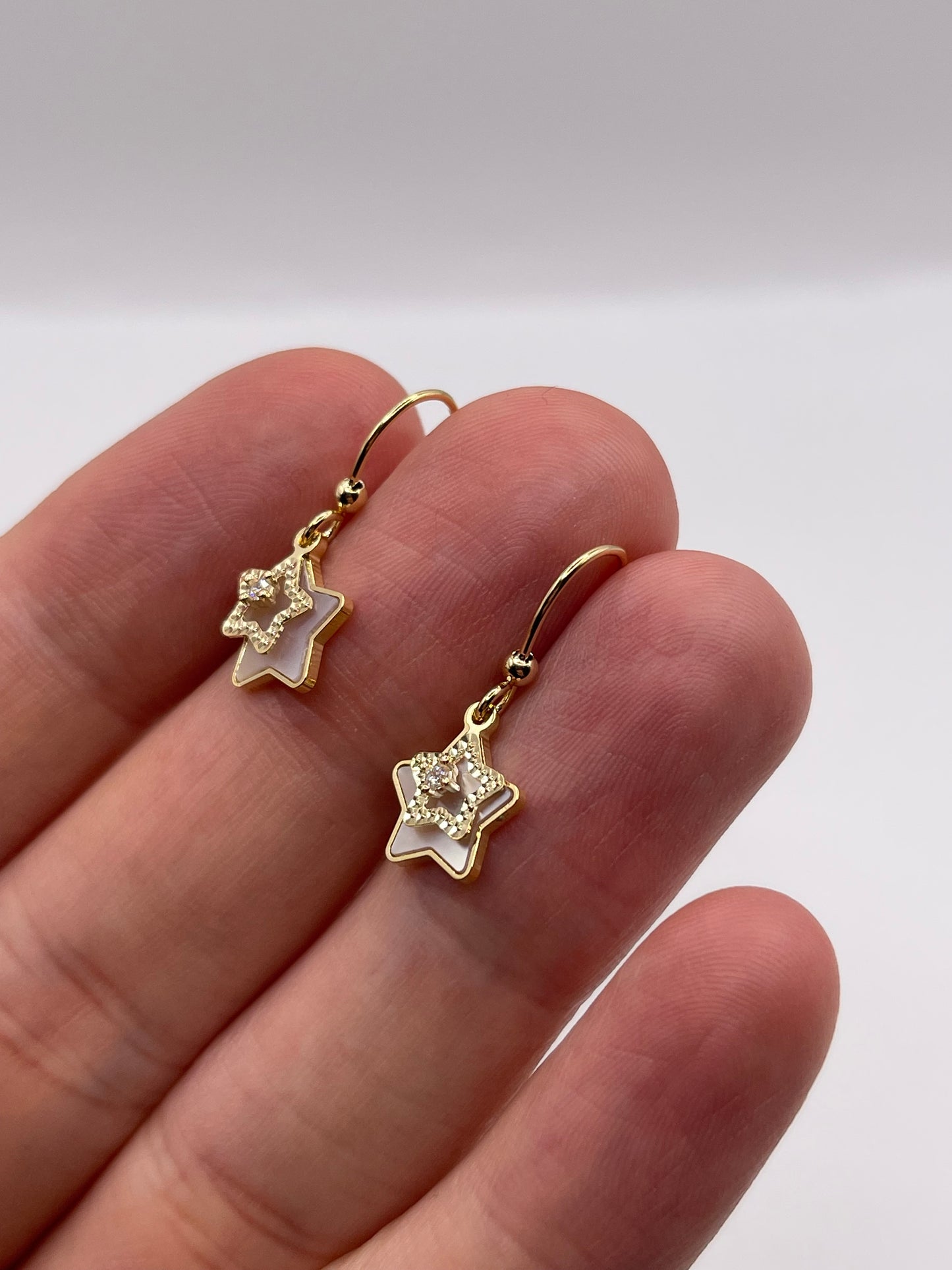 9ct gold mother of pearl star earrings