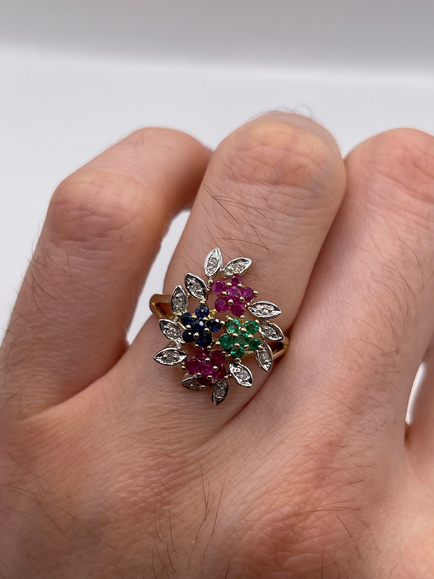 9ct gold ruby, emerald, sapphire and diamond ring