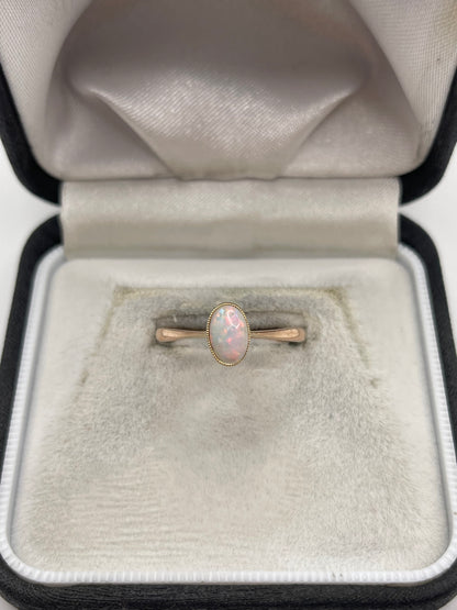 Antique 9ct rose gold opal ring