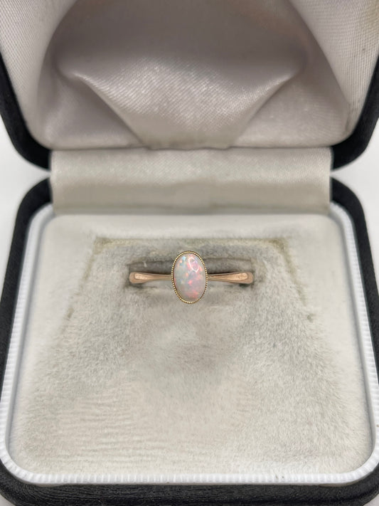 Antique 9ct rose gold opal ring