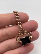 Load image into Gallery viewer, Antique 9ct rose gold carnelian and onyx spinning fob pendant
