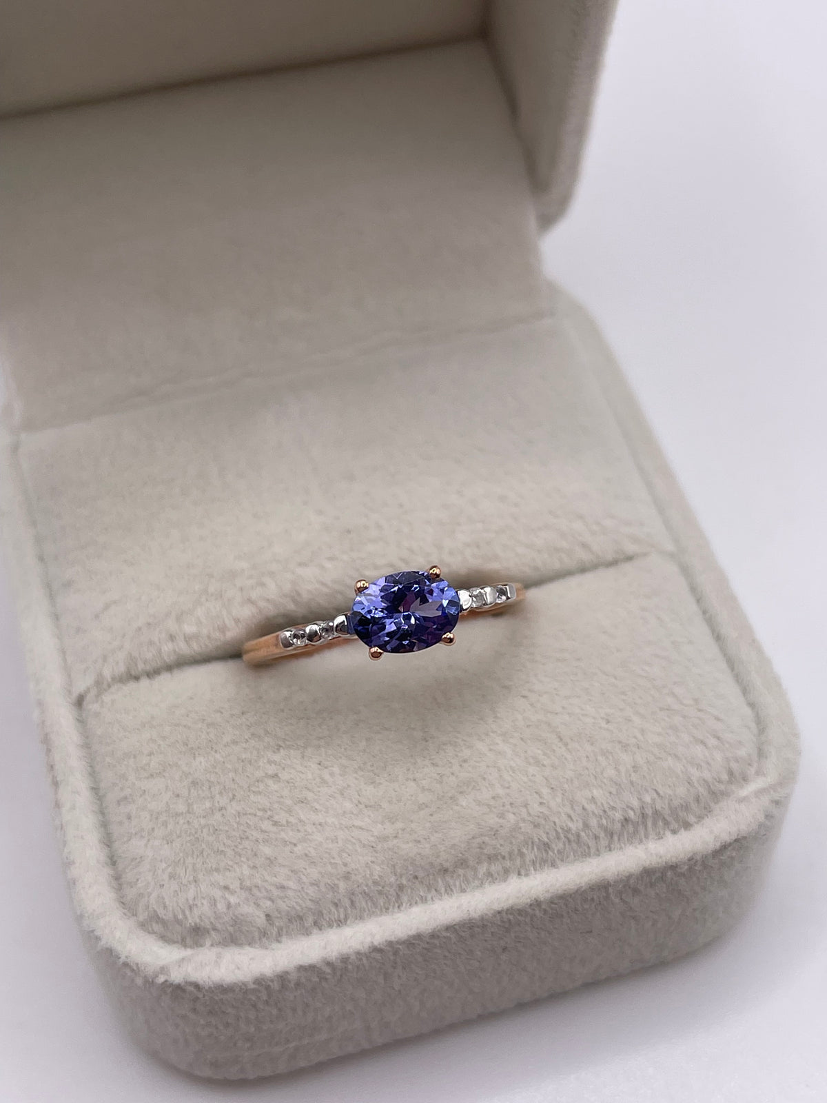 9ct rose gold tanzanite and zircon ring