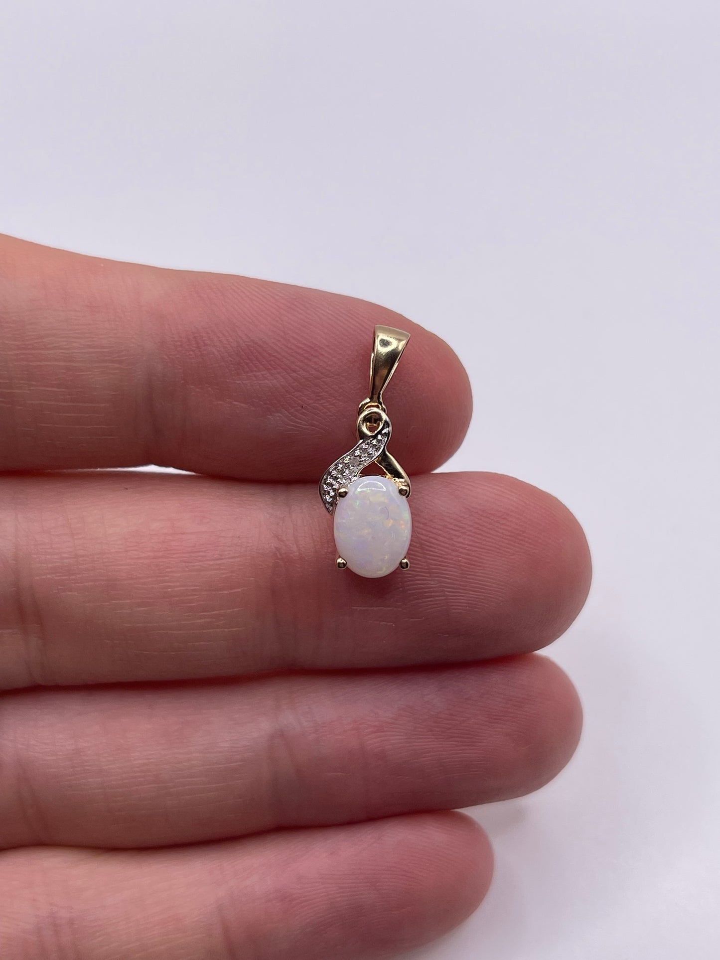 9ct gold opal and diamond pendant
