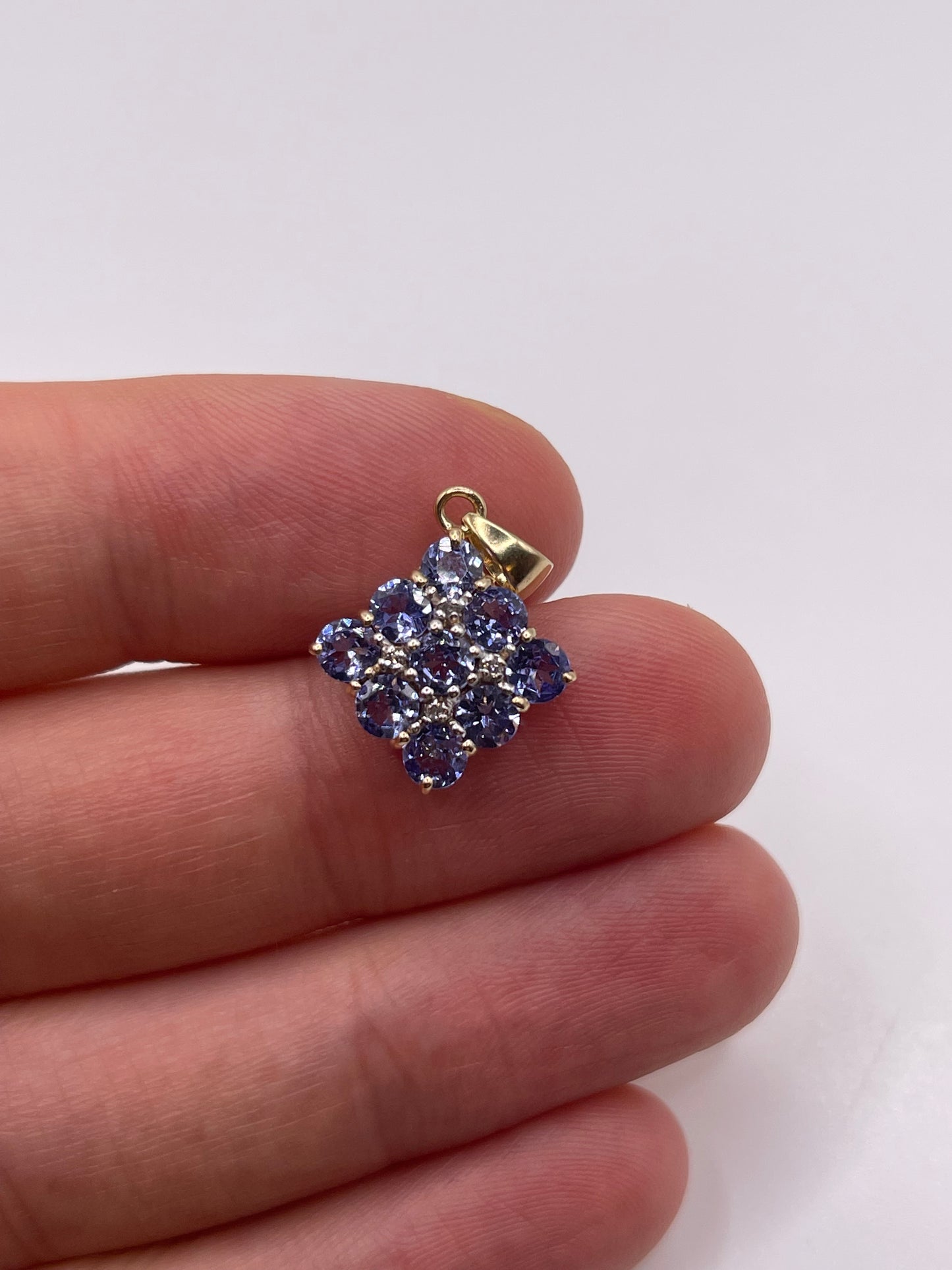 9ct gold tanzanite and diamond pendant