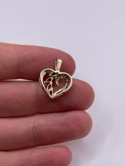 9ct gold ruby and zircon heart pendant