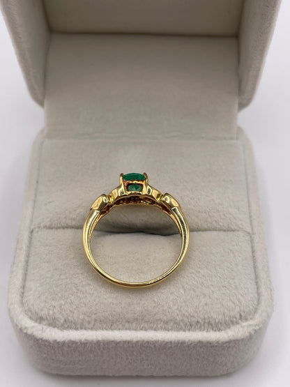 18ct gold emerald and diamond ring
