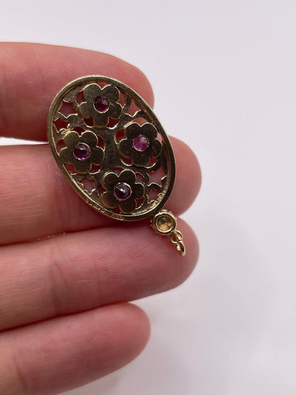 9ct gold ruby and diamond pendant