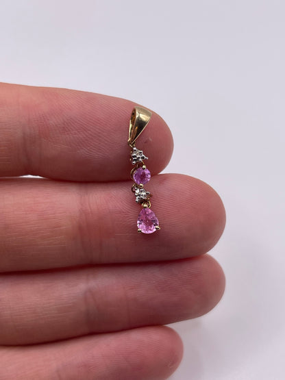 9ct gold pink sapphire and diamond pendant