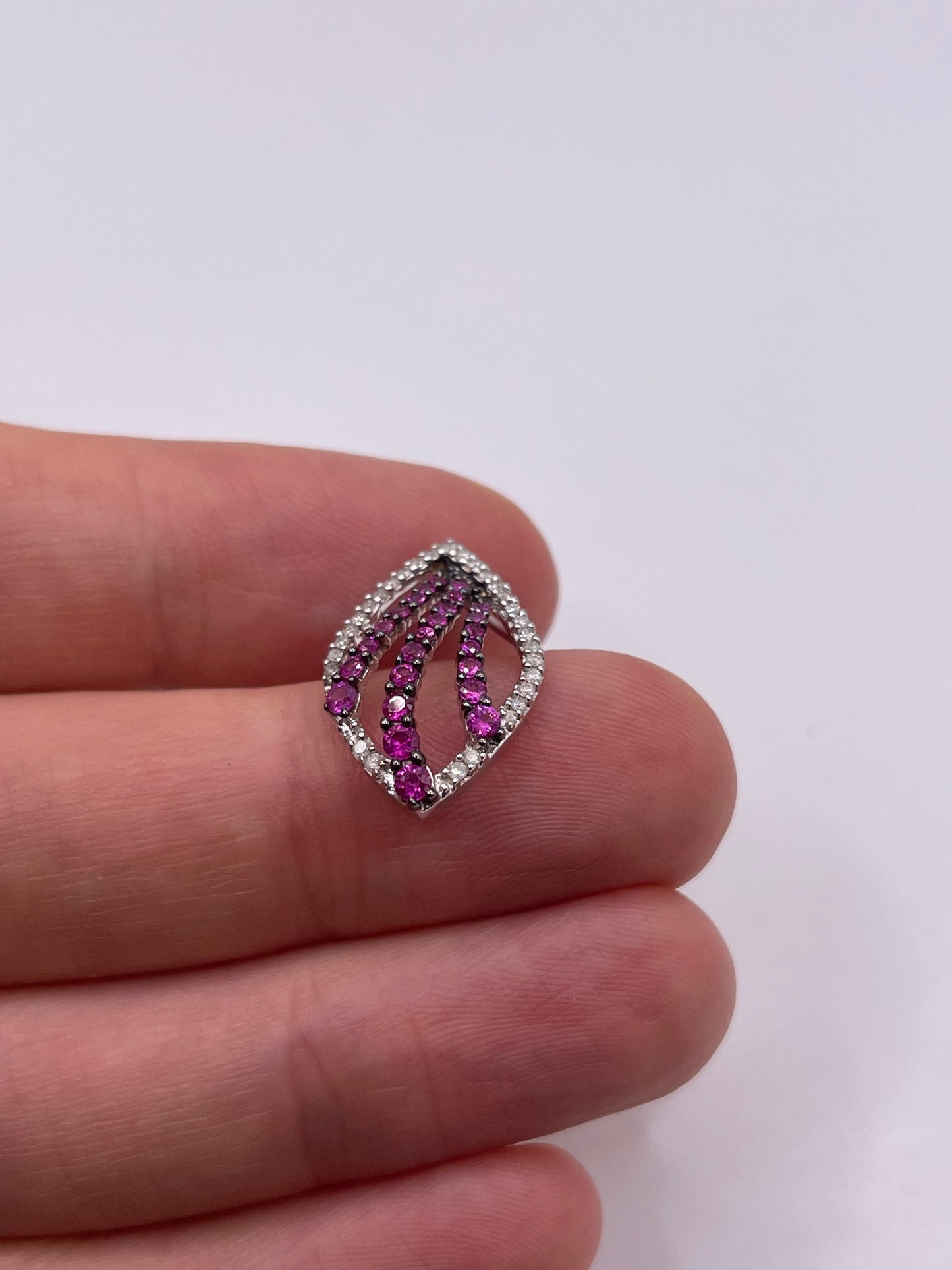 9ct white gold ruby and diamond pendant