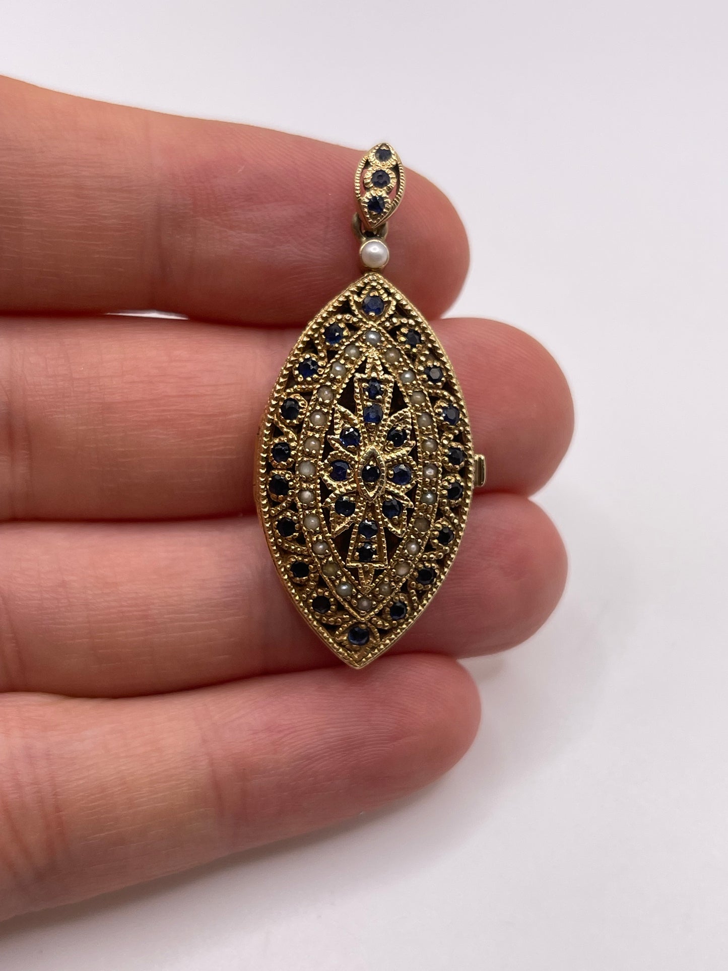 9ct gold sapphire and pearl locket pendant