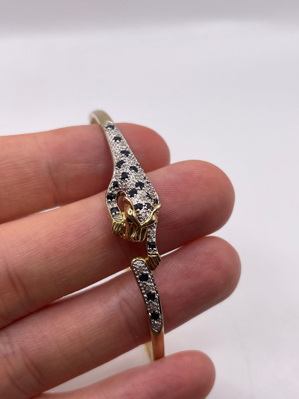 9ct gold sapphire and diamond panther bangle