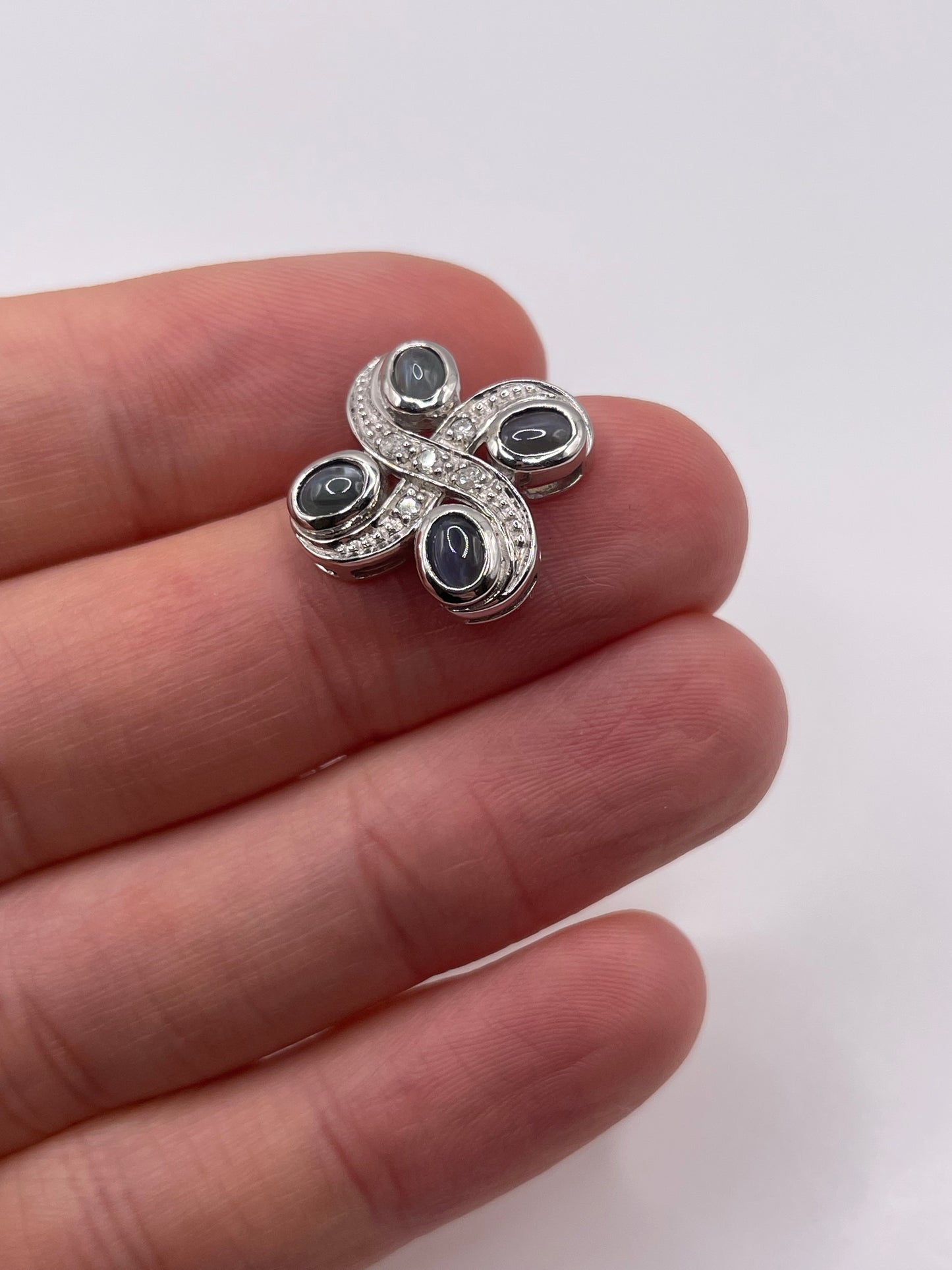 9ct white gold cats eye and diamond pendant