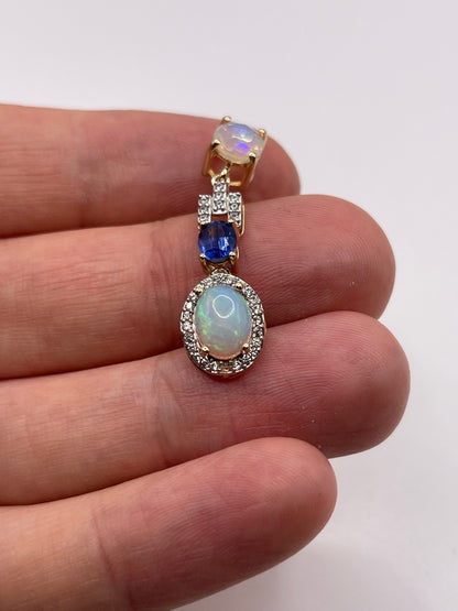 9ct gold opal, kyanite and zircon pendant
