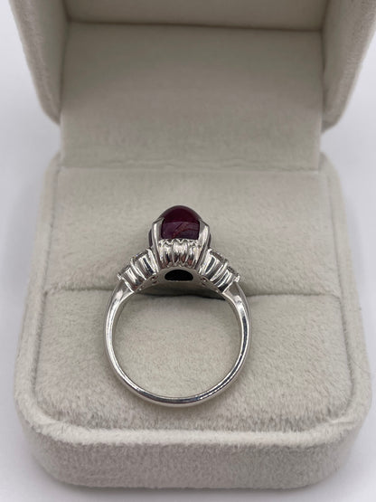 Platinum star ruby and diamond ring