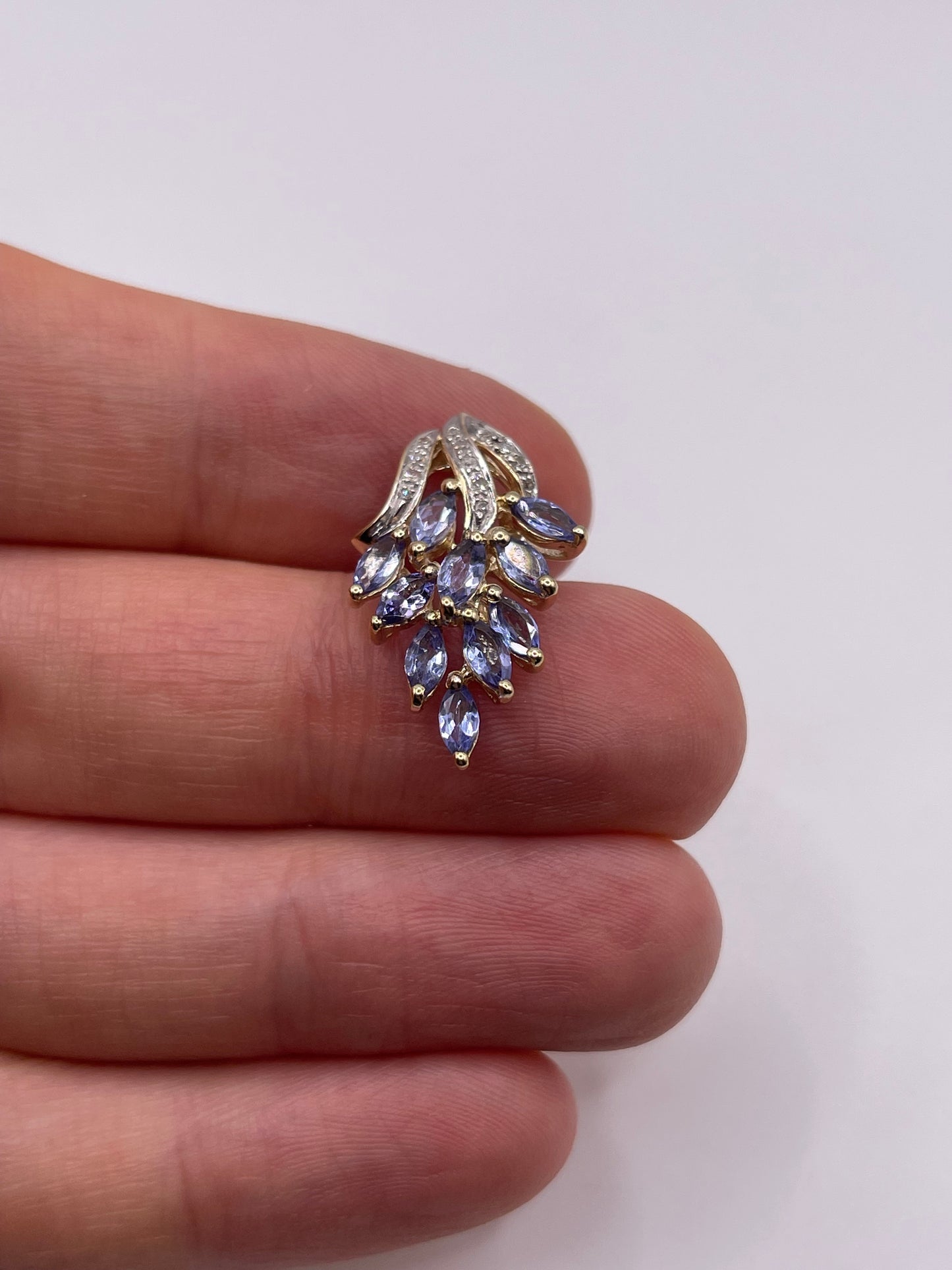 9ct gold tanzanite and diamond pendant