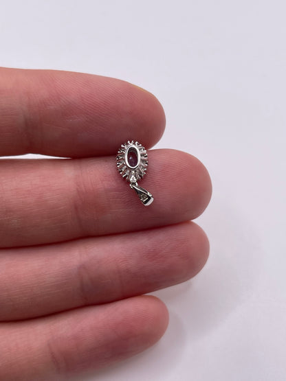 9ct white gold tanzanite and diamond pendant