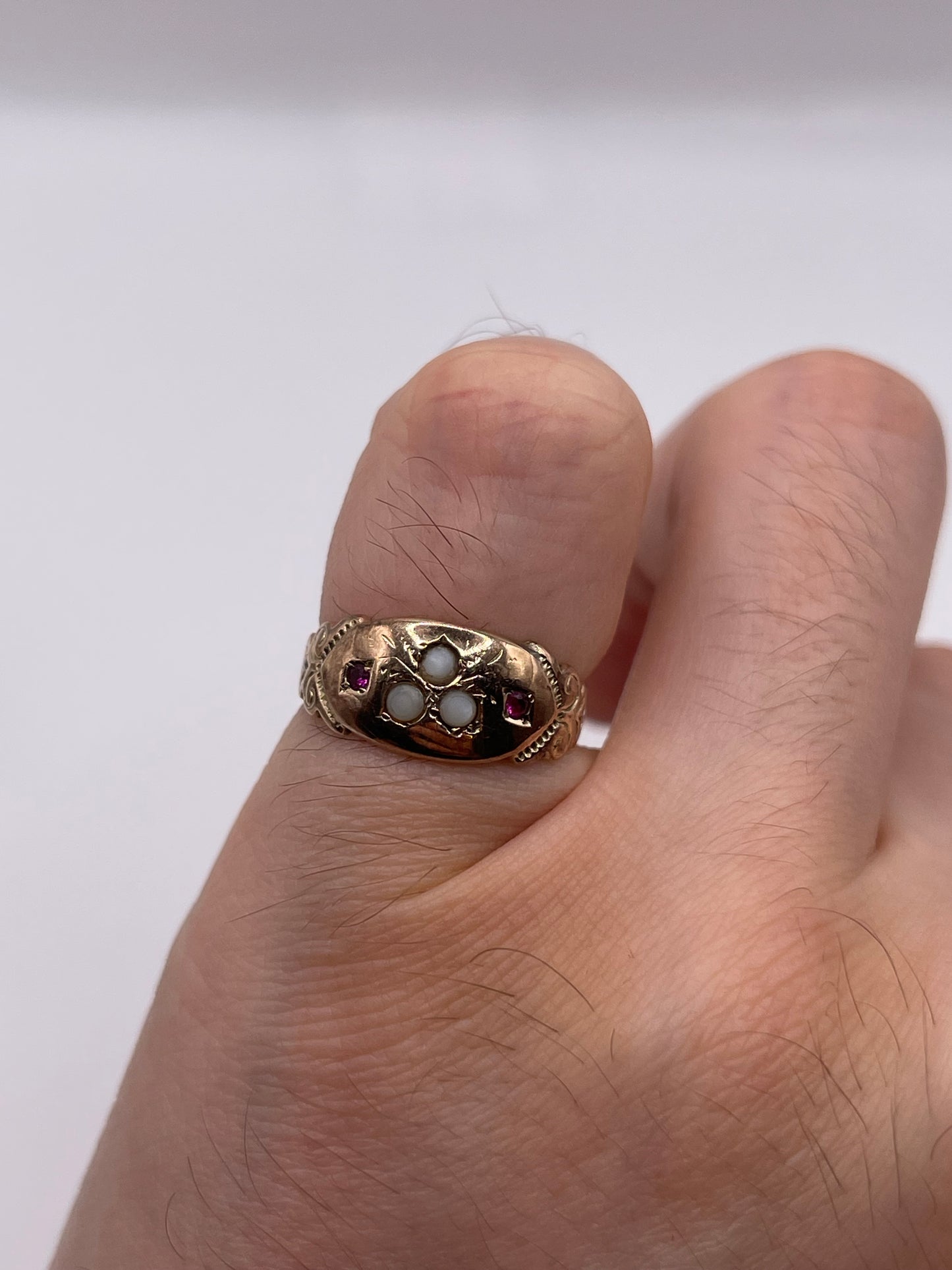 Antique 9ct rose gold garnet and pearl ring