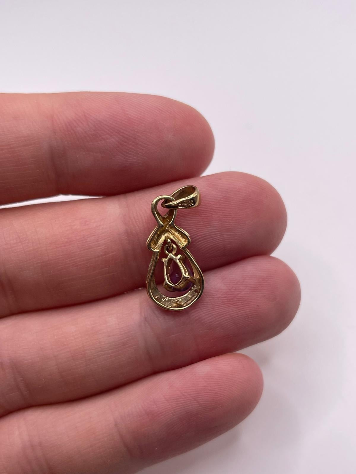 9ct gold amethyst and diamond pendant