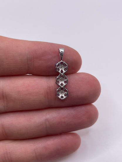 9ct white gold tanzanite and diamond pendant