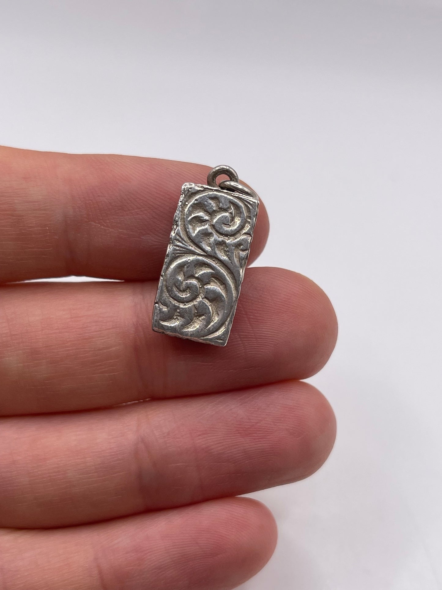 Silver ingot pendant