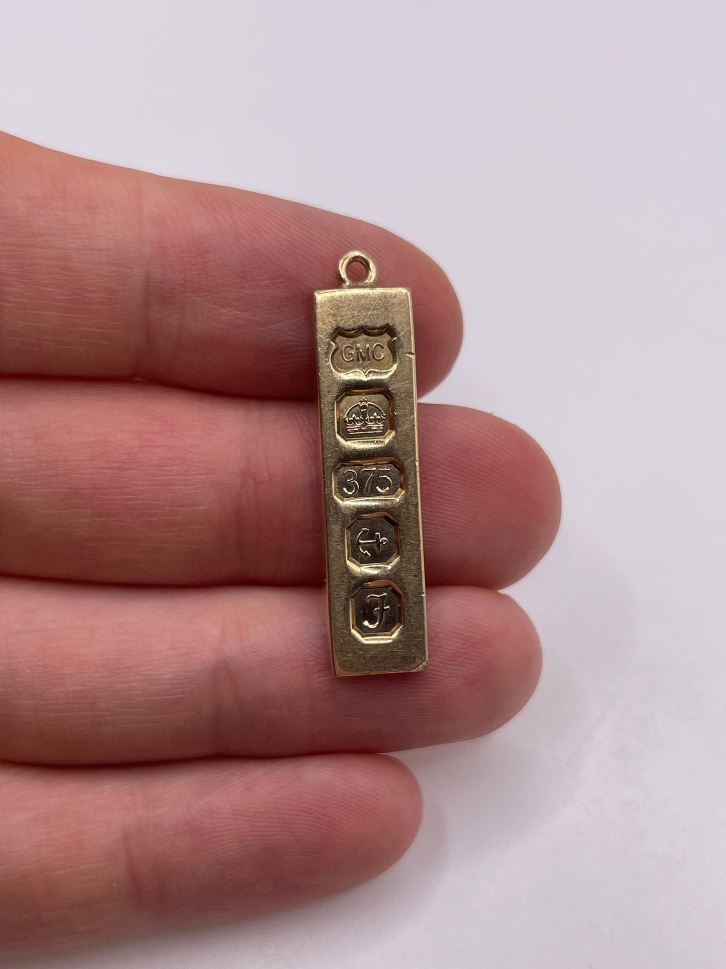 Heavy 9ct gold ingot pendant