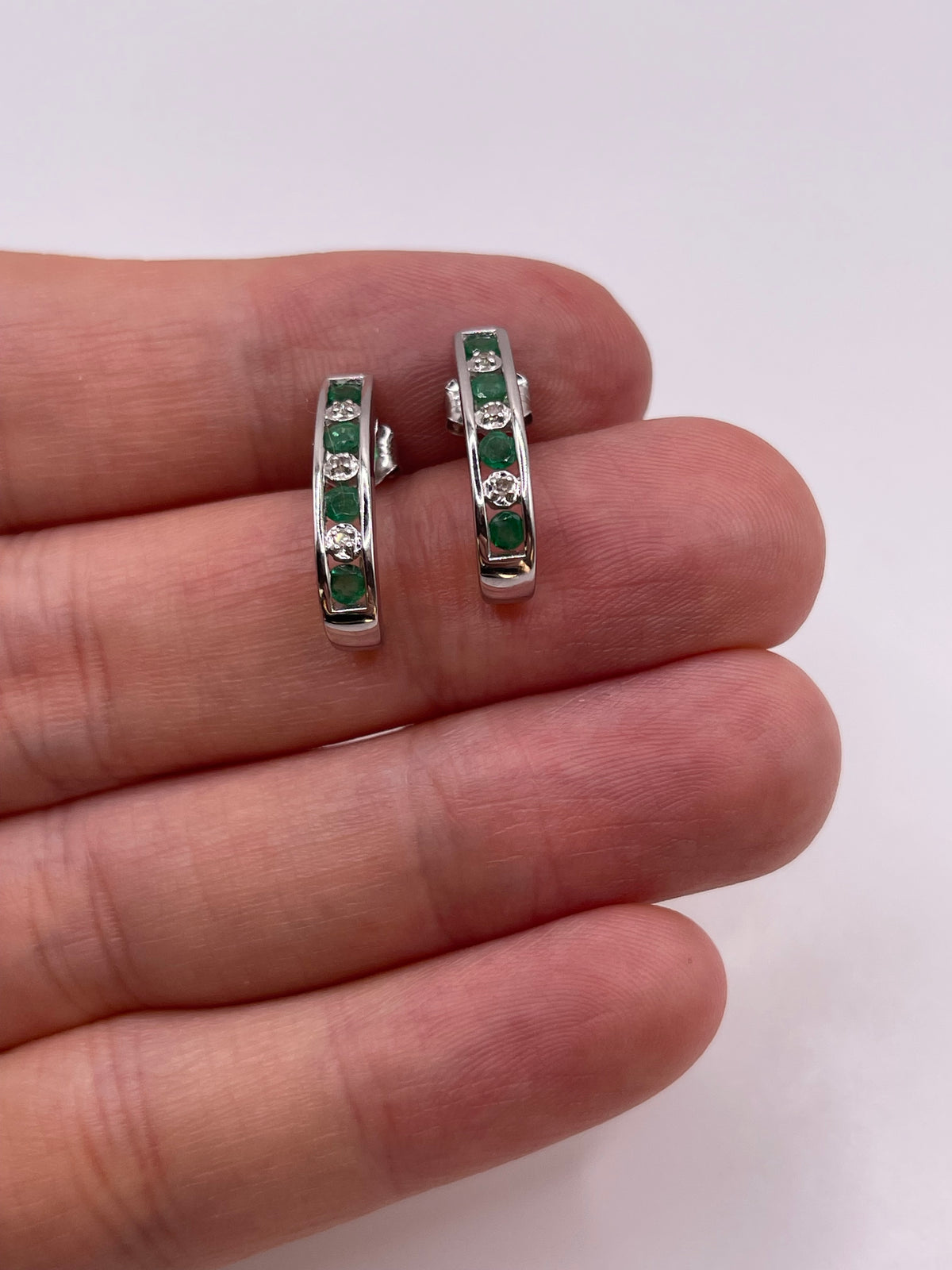 14ct white gold emerald and diamond earrings