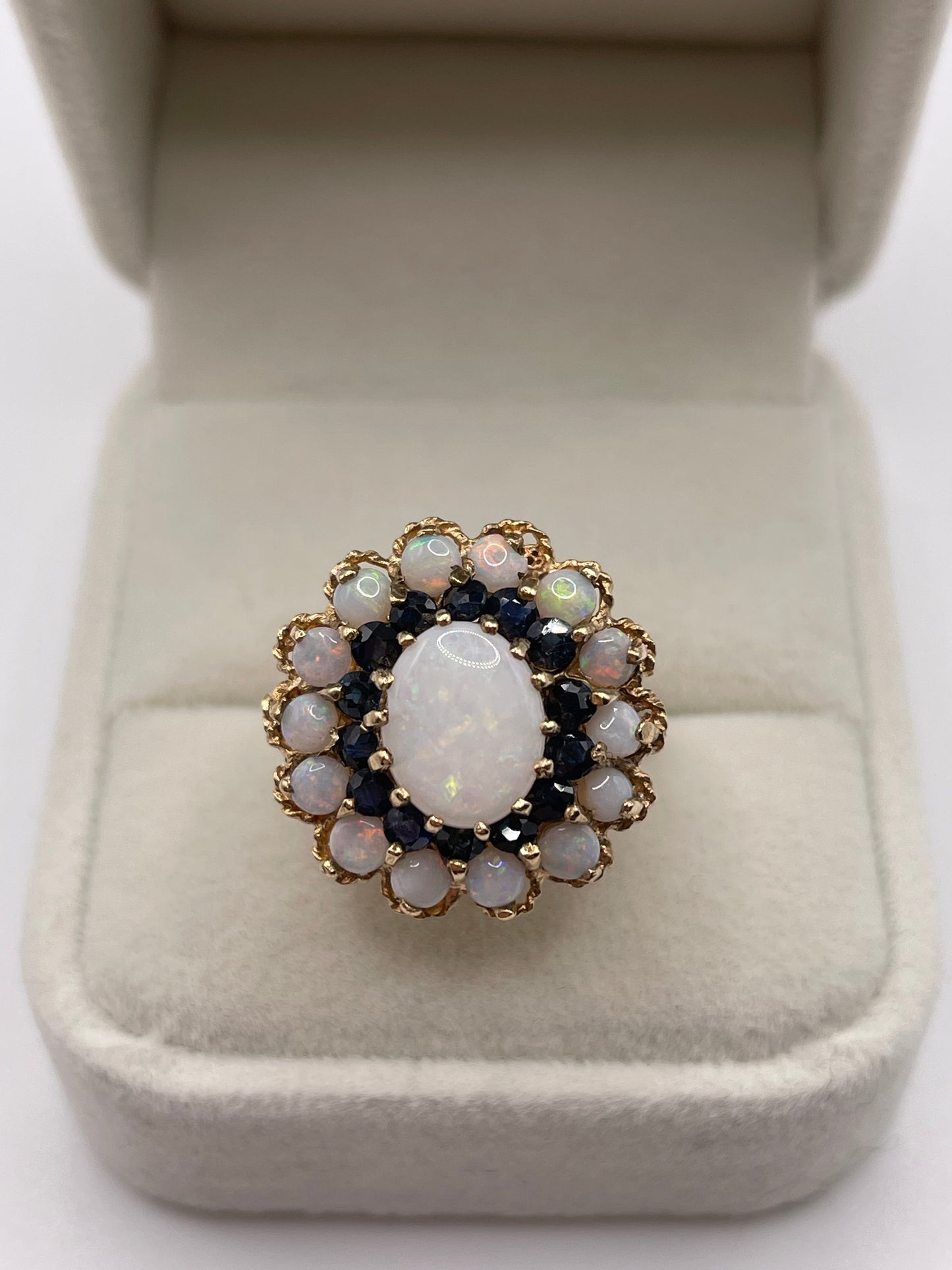 Heavy 9ct gold opal and sapphire cluster ring