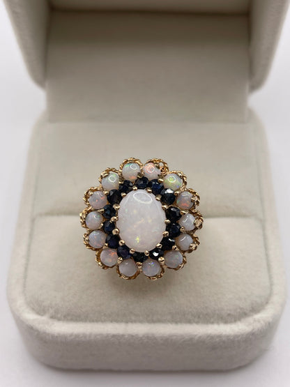 Heavy 9ct gold opal and sapphire cluster ring