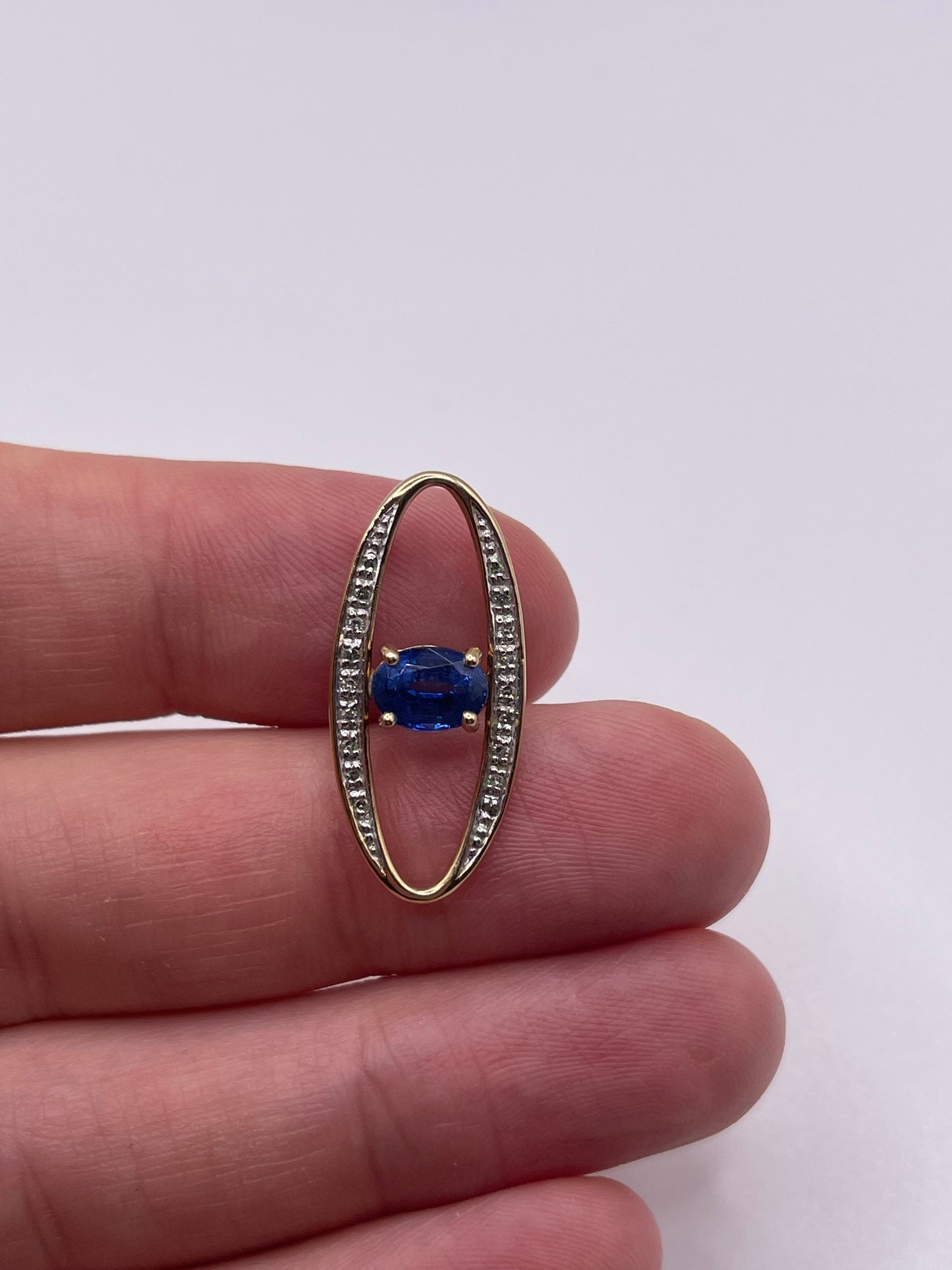 9ct gold kyanite and diamond pendant