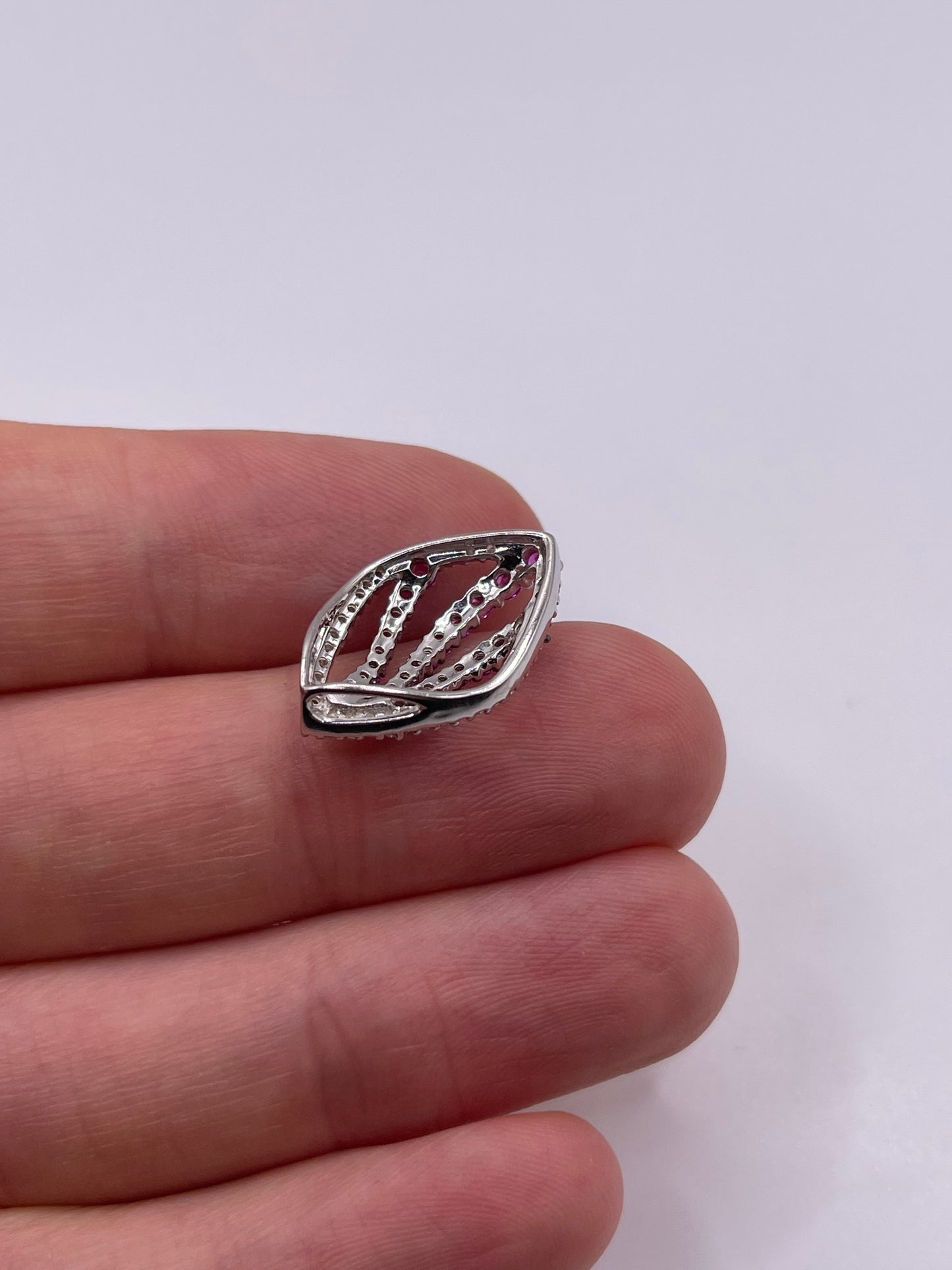 9ct white gold ruby and diamond pendant