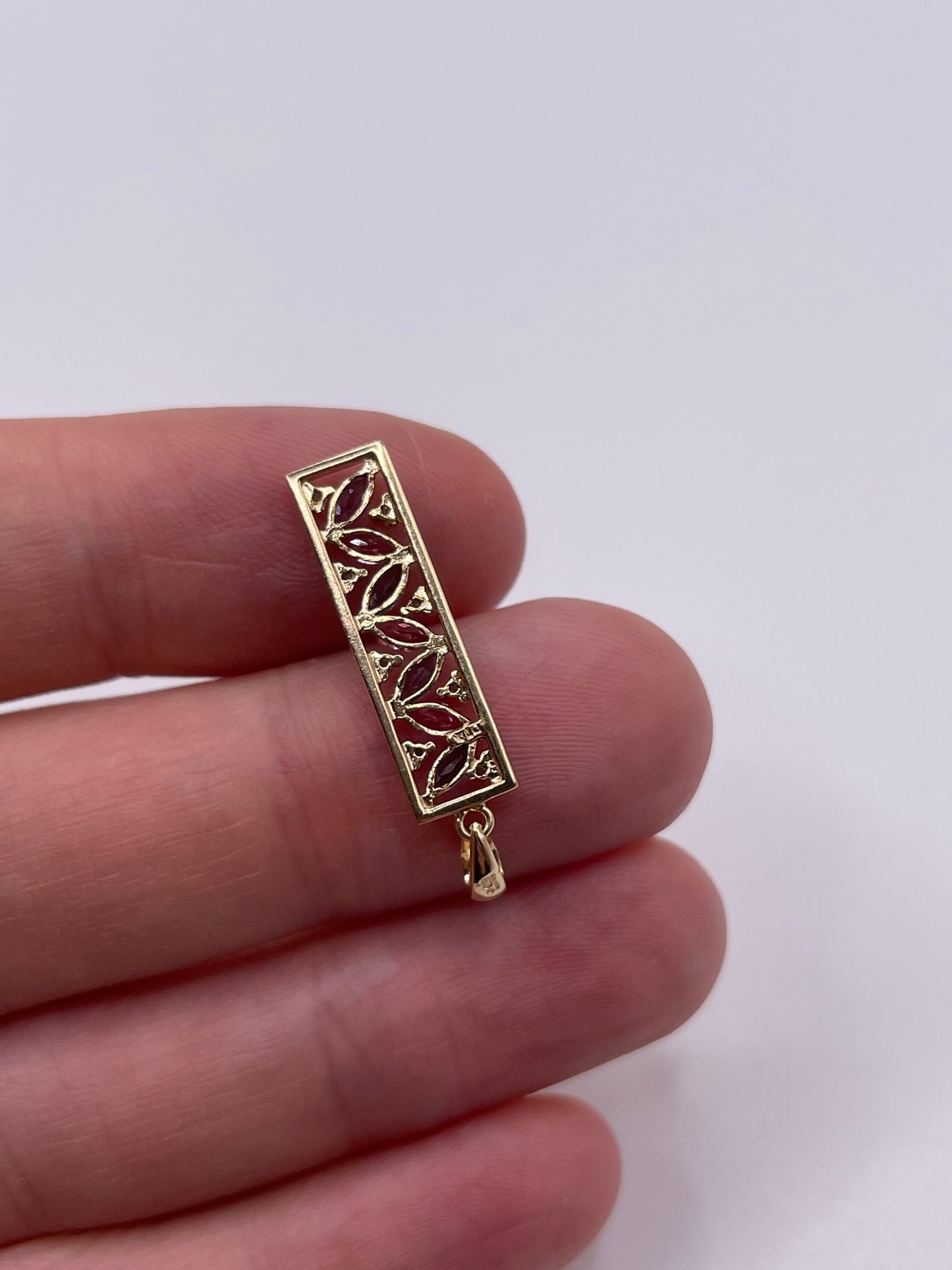 9ct gold iolite, topaz and diamond pendant