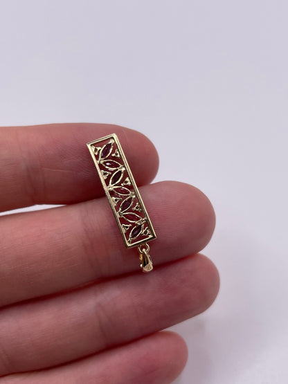 9ct gold iolite, topaz and diamond pendant