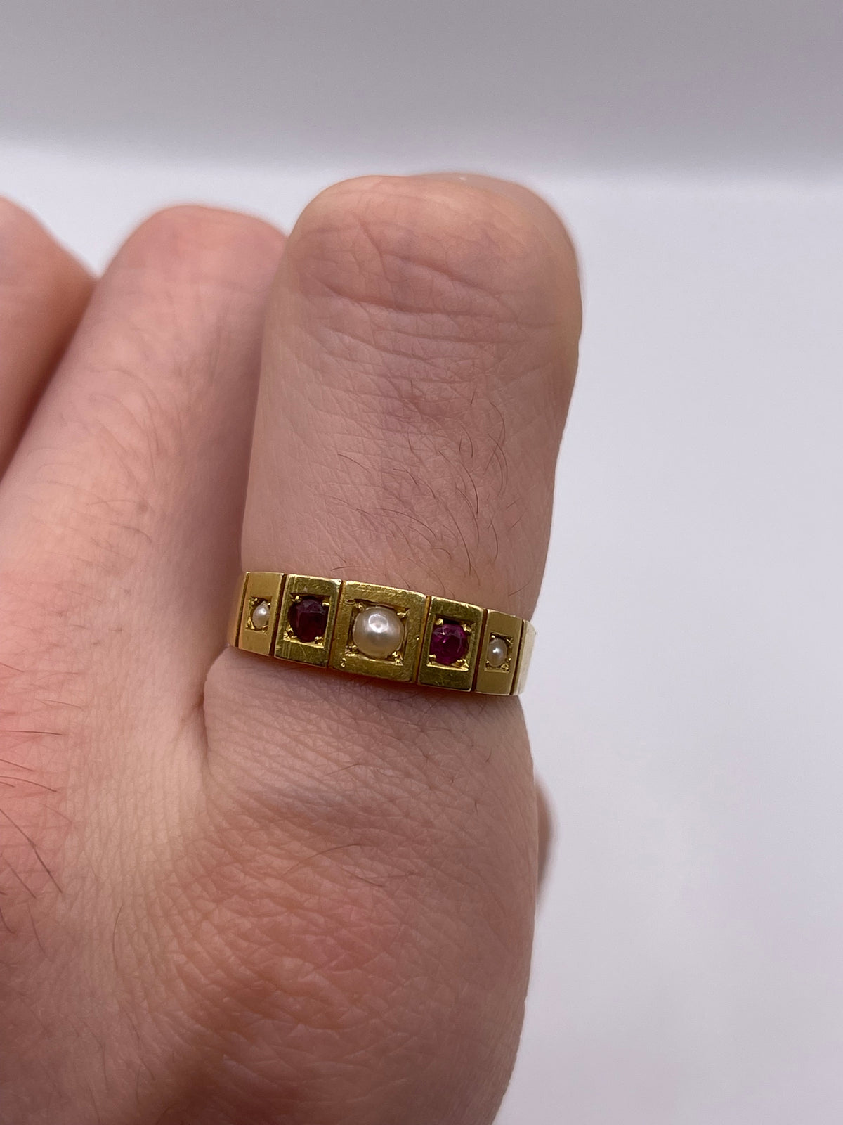 Antique 18ct gold ruby and pearl ring