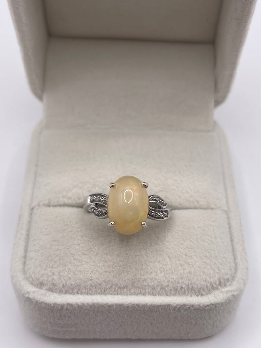 9ct white gold opal and diamond ring