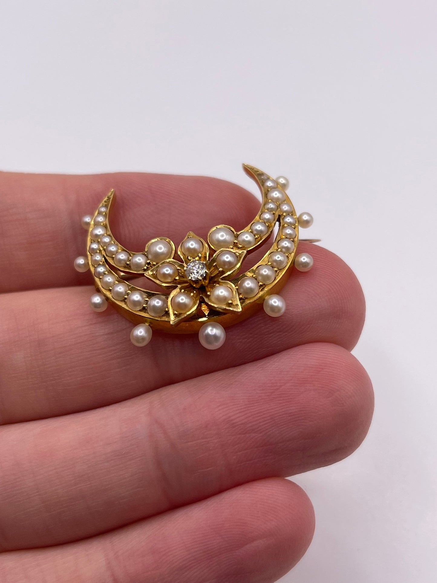 Antique 18ct gold pearl and diamond crescent brooch