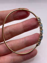 Load image into Gallery viewer, 9ct gold blue topaz and diamond bangle
