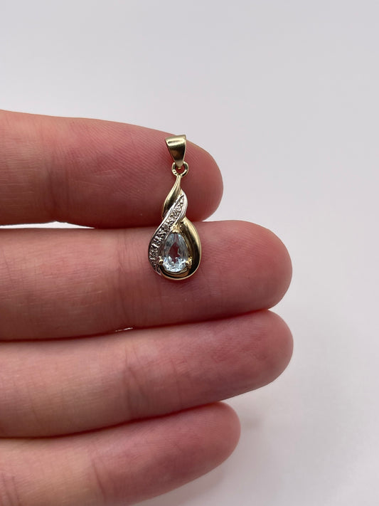 9ct gold topaz and diamond pendant