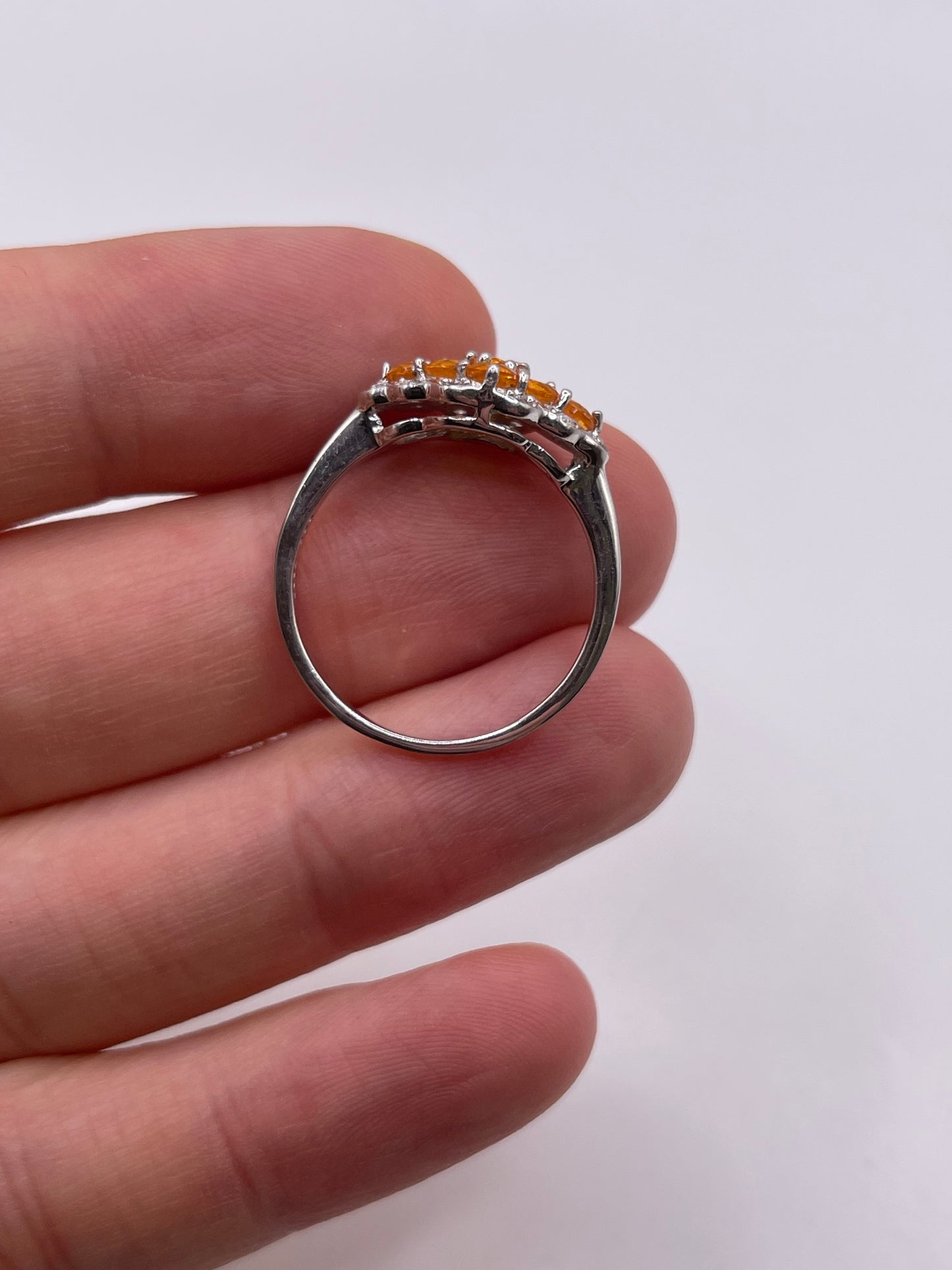 Silver orange sapphire ring