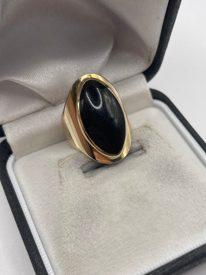 Heavy 9ct gold onyx ring