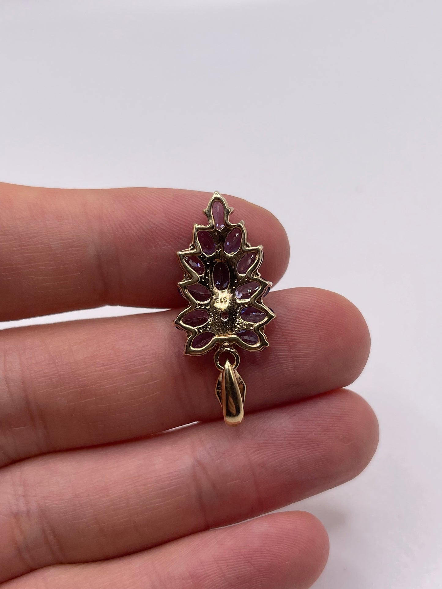 9ct gold tanzanite and diamond pendant