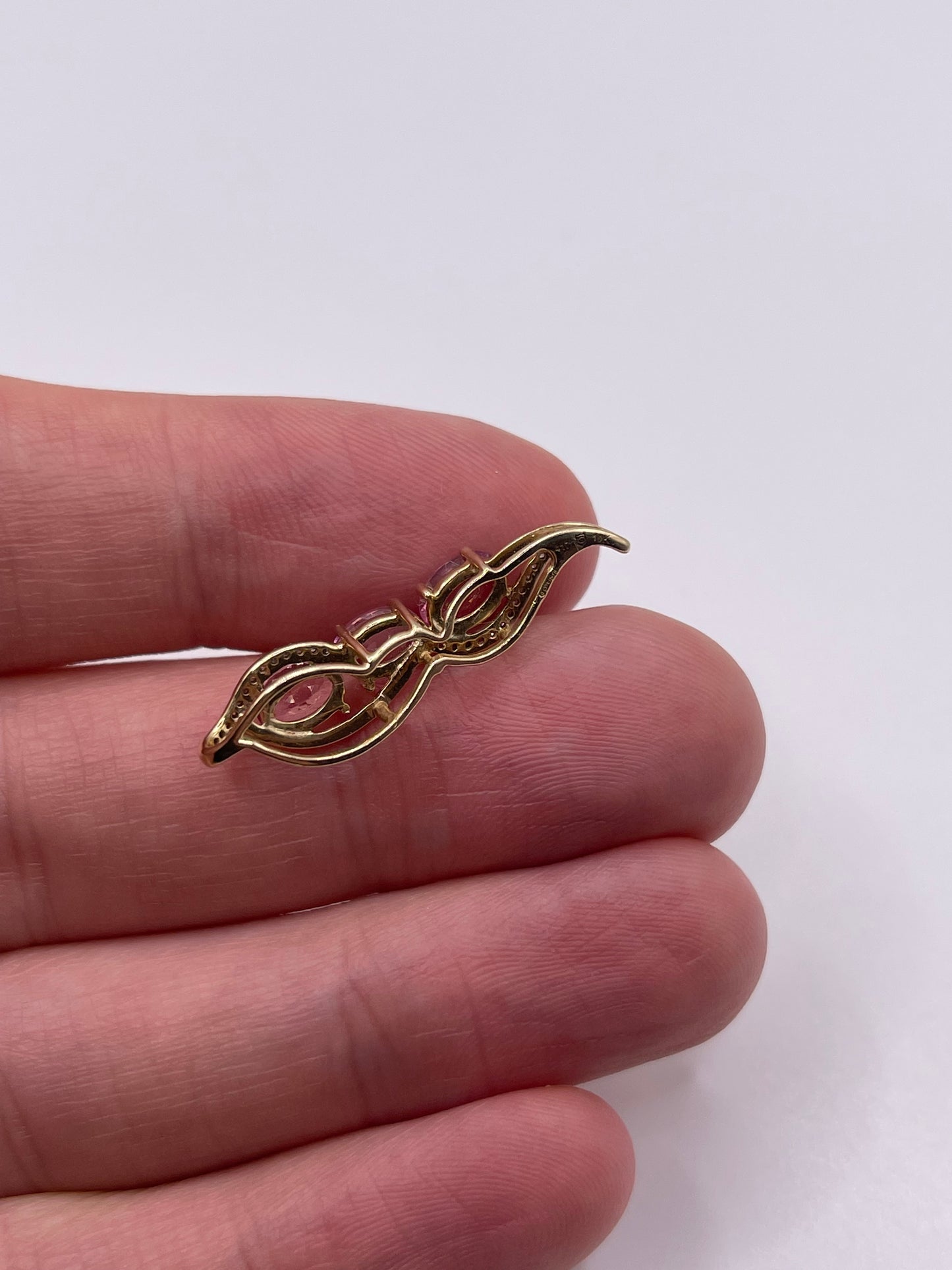 9ct gold pink sapphire and diamond pendant